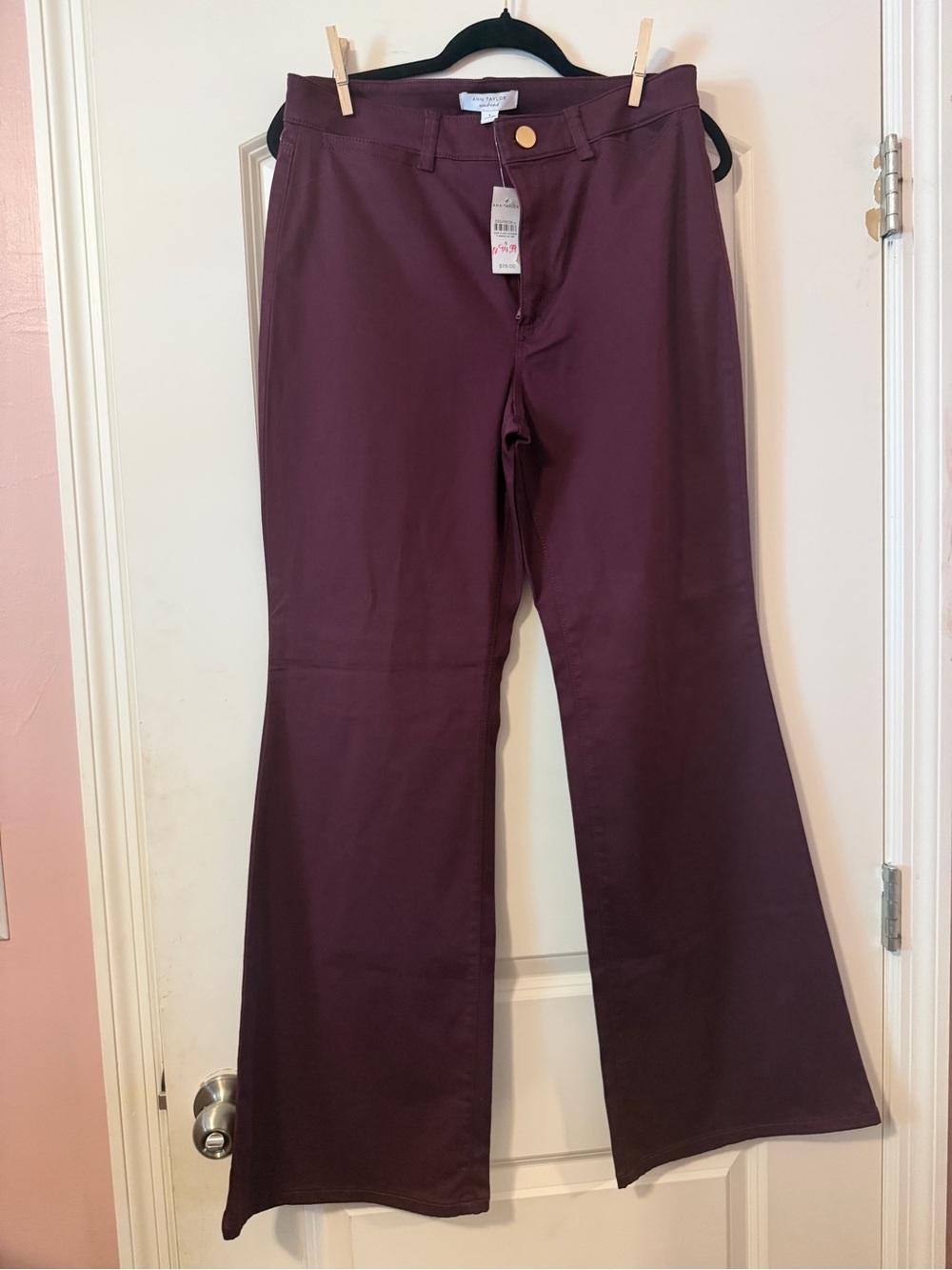 Women’s Ann Taylor size 8 NWT Pant MSRP $119. Flare leg, Deep Plum, 31” inseam.